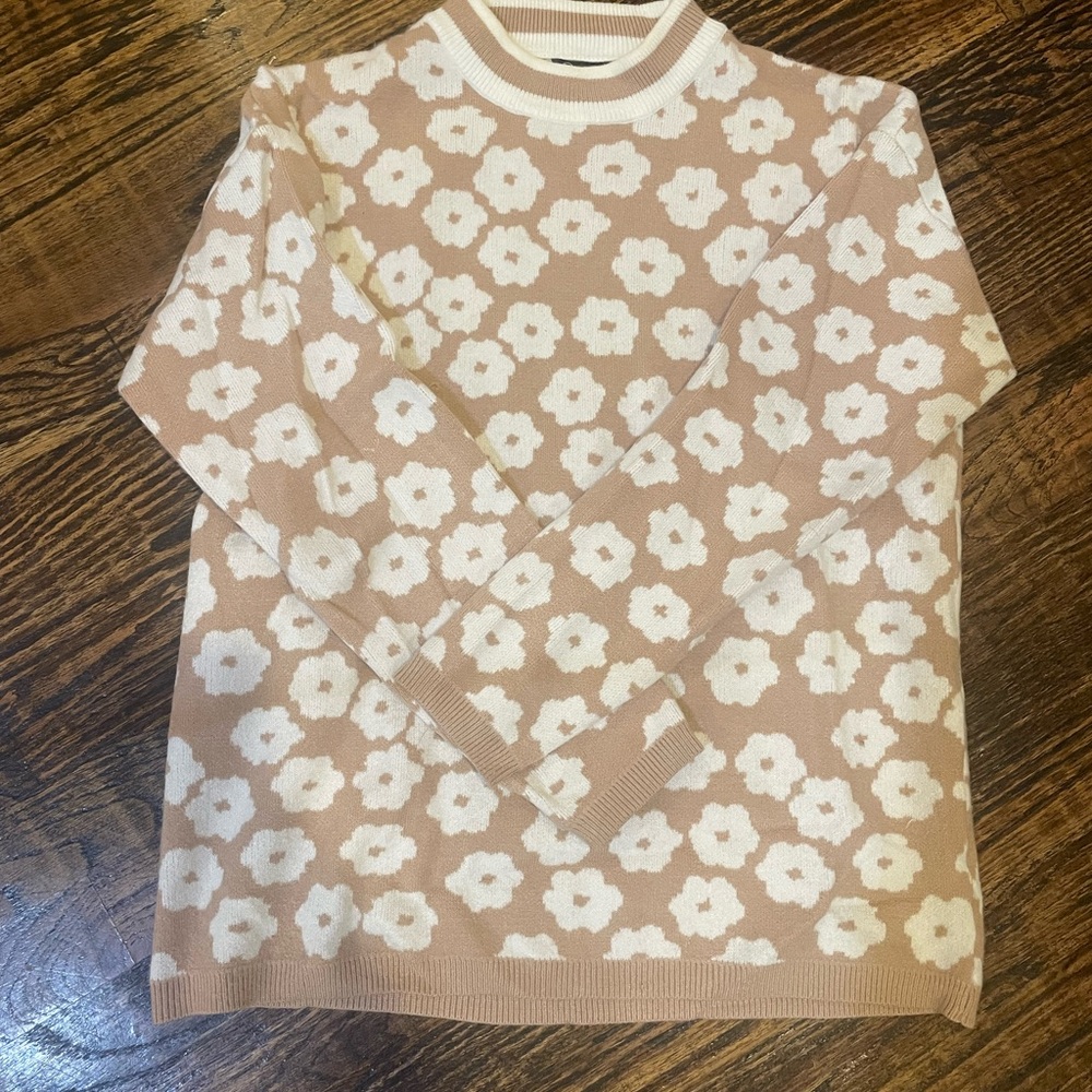 Tan and white floral sweaters EUC, size small.